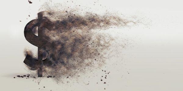 Dollar sign disintegrating into particles, symbolizing financial loss.
