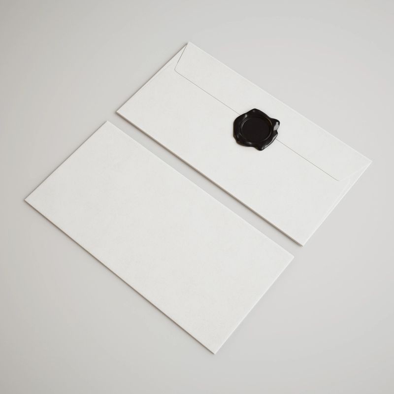 Paper envelope with wax seal and rope