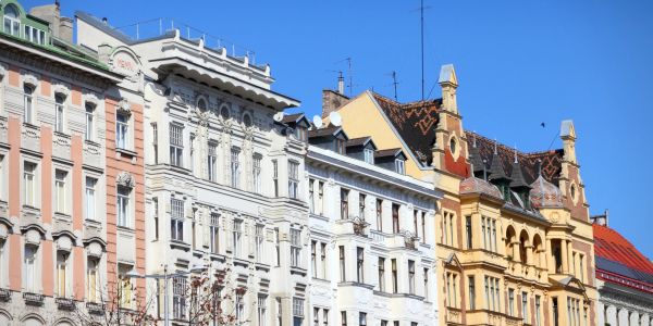 Colorful historic buildings under a clear blue sky.