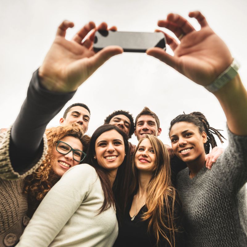 Group of college student laughing and doing a selfie