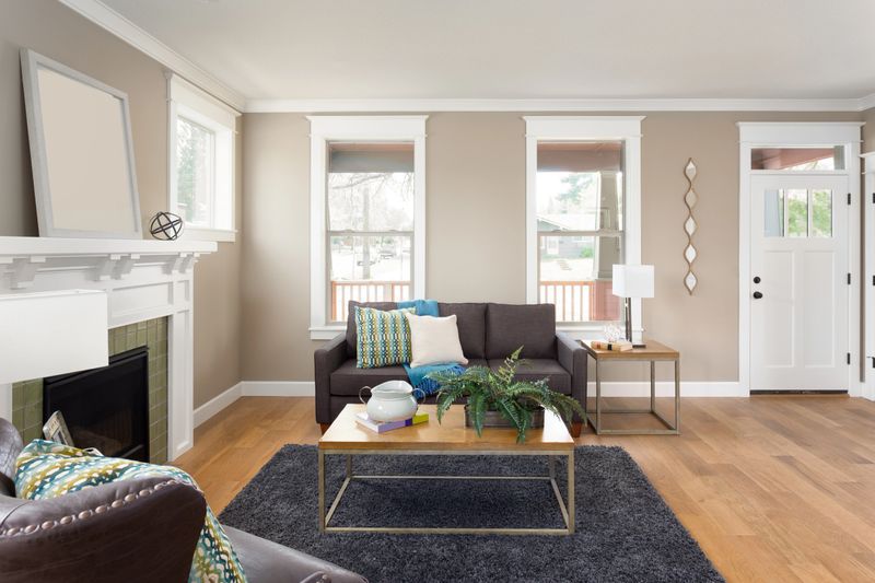 Beautiful living room interior with hardwood floors and fireplace in new home