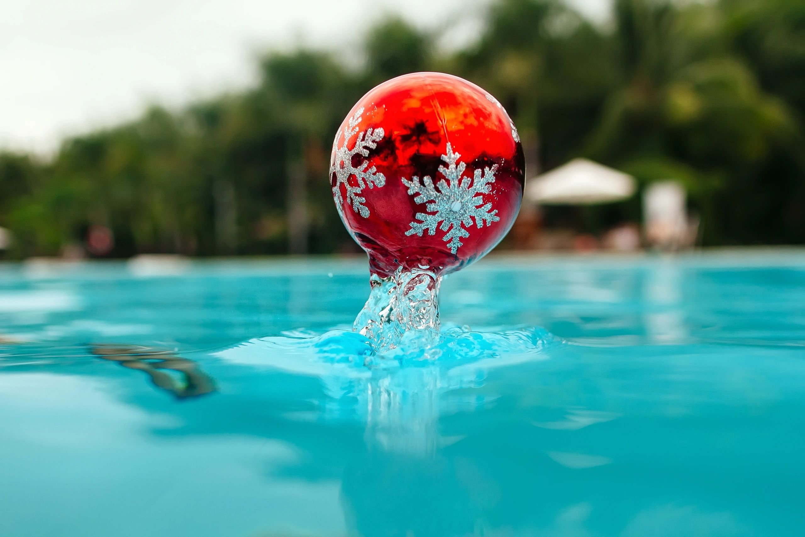 new year tree decoration in the water, christmas decoration in blue water in tropics