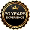 Golden badge celebrating 20 years of experience with a crown design.