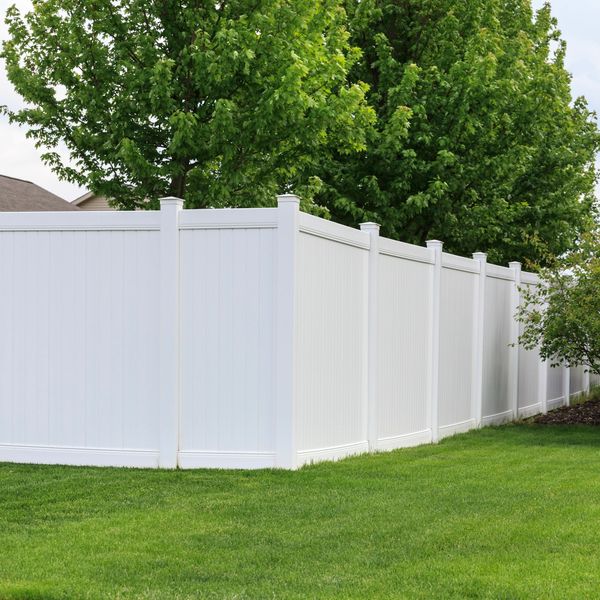 Privacy fence installation in Oklahoma built to withstand high winds by the expert Safe Roof team.