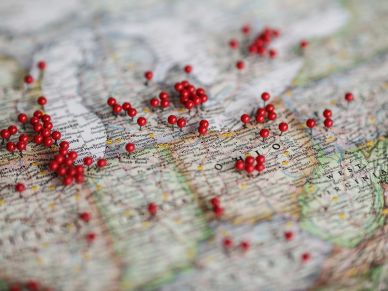 Map with numerous red pins marking various locations across the United States.