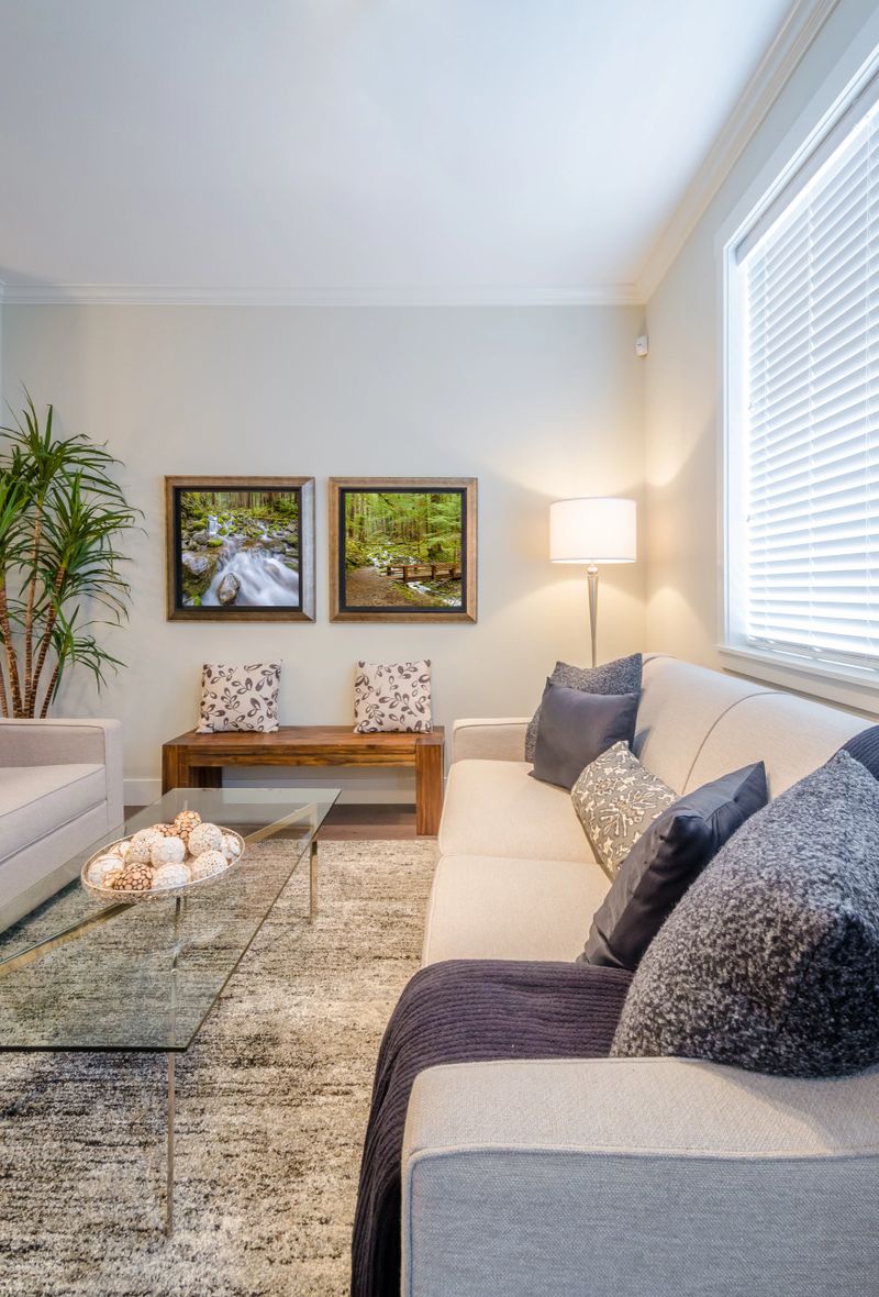 Living room with furnishings in a new house with nice wood floors!