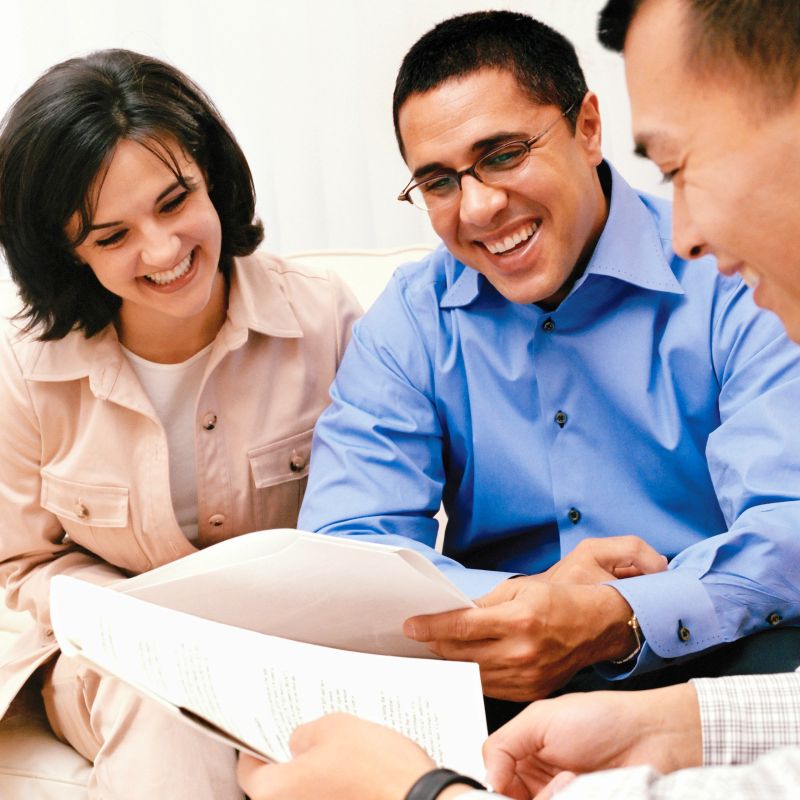 A consultation meeting with a hispanic couple.