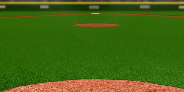 View from home plate looking toward the pitcher's mound on a baseball field.