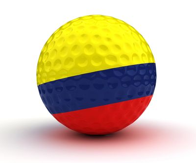 Golf ball painted like the Colombian flag.