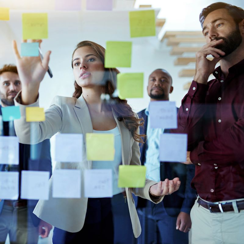 Cropped shot of a group of colleagues brainstorming in the office