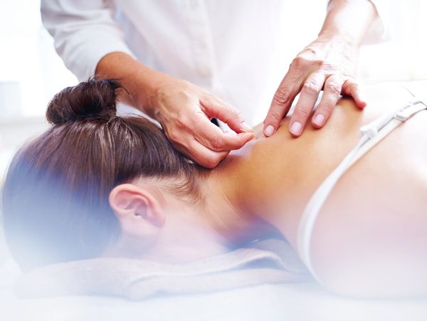 Lady receiving acupuncture in Encino, 91316