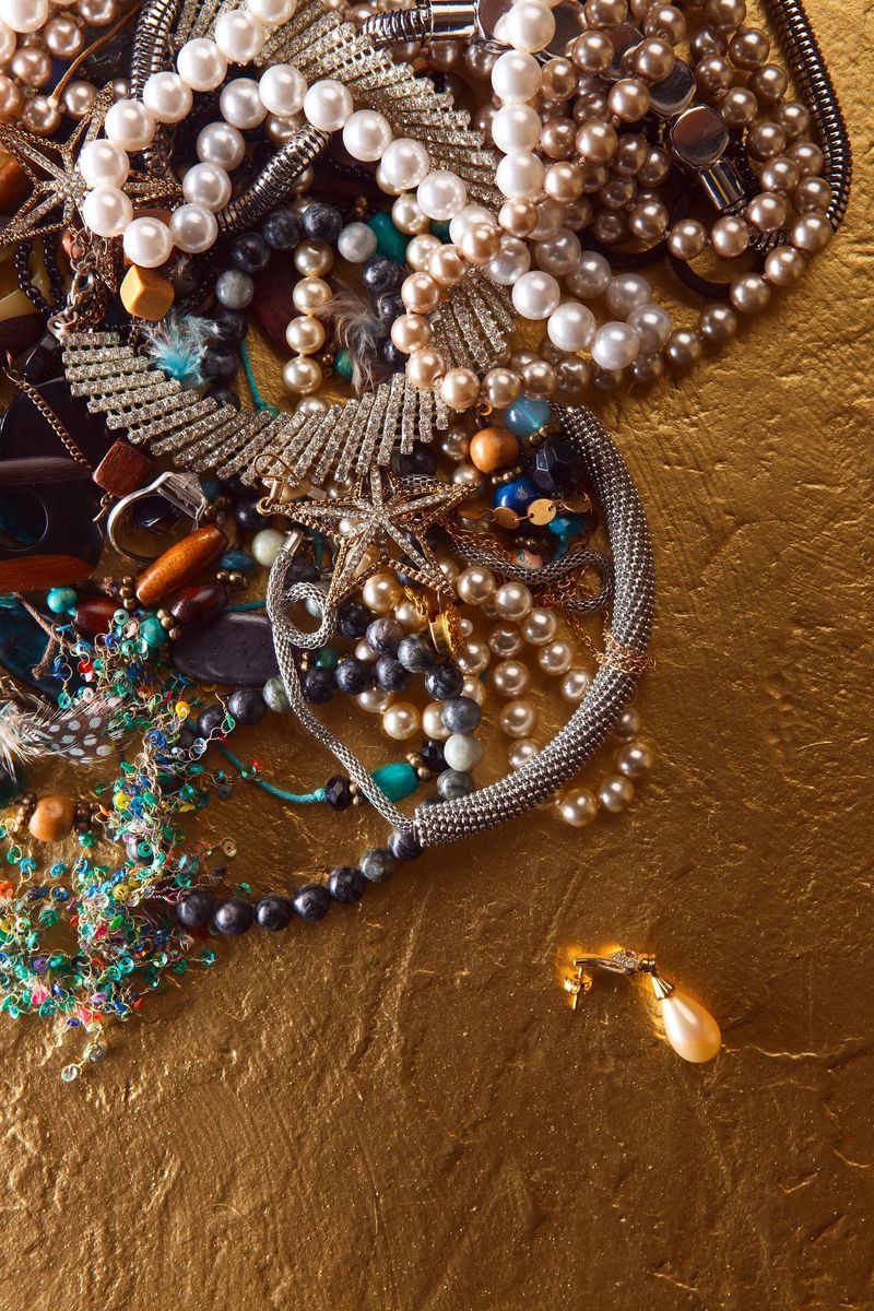 various jewelry on a gold background