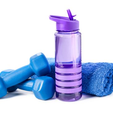 Purple water bottle, blue dumbbells, and towel.