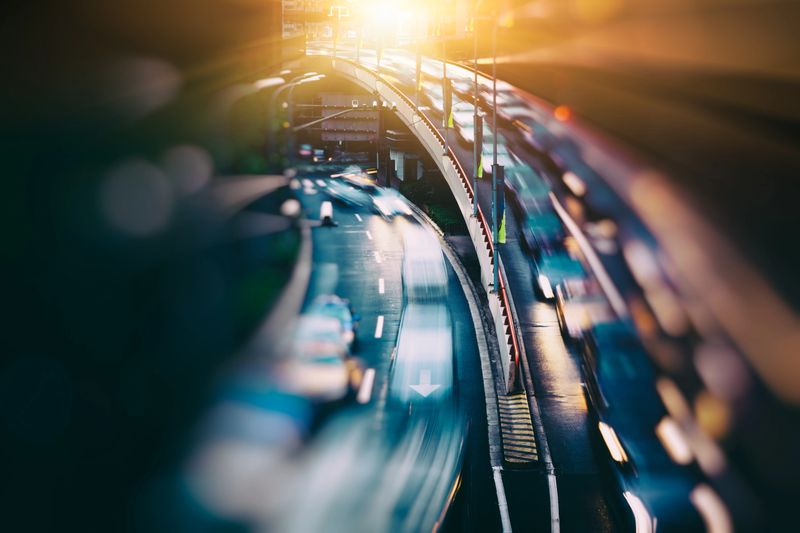 The urban view of  vehicle light trails on the road.