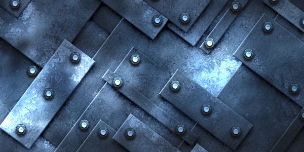 Patterned metal sheets with bolts.