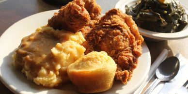 Plate with fried chicken, mashed potatoes, and cornbread.