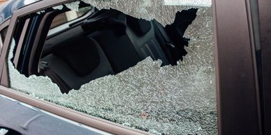 Break-in or other damage to side glass. 