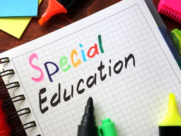 Special education written on a graph paper with various markers