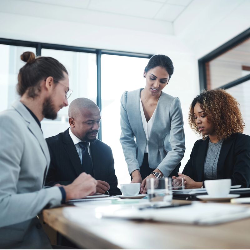 Shot of a group of businesspeople having a discussion in a boardroom