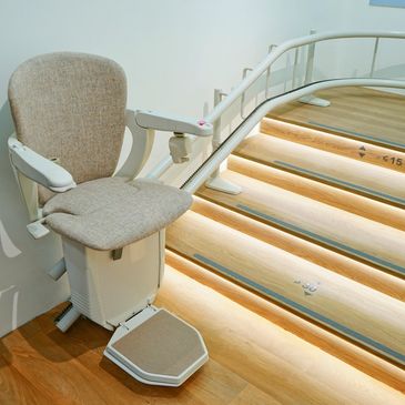 Stair lift upstairs with a curve.