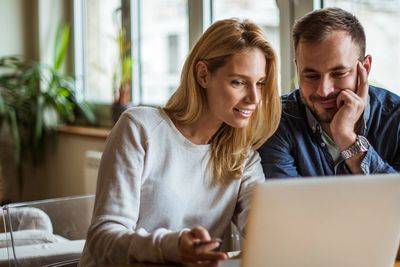 Couple Reading Online Info