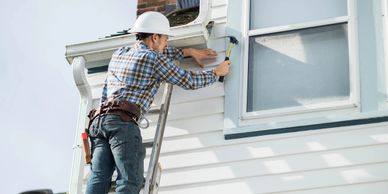 Gutter and siding installation by Pro Solutions.