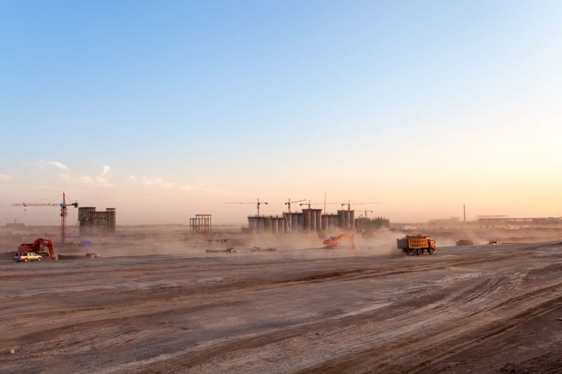 construction site of coal washery,  dust was blowing at dusk