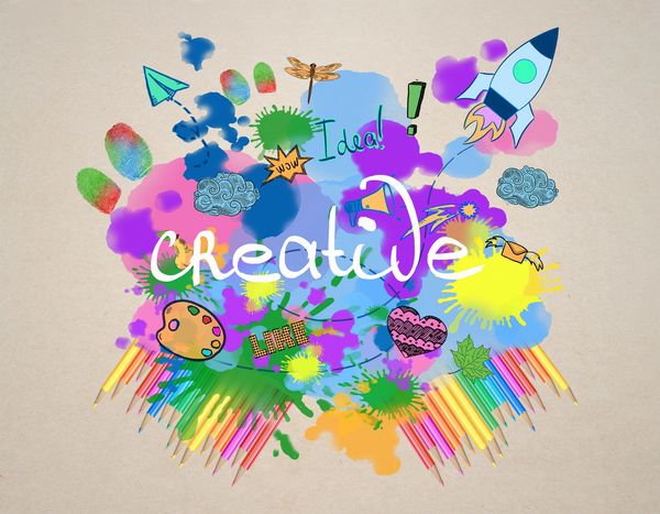Colorful creative doodles with paint splashes and pencils.