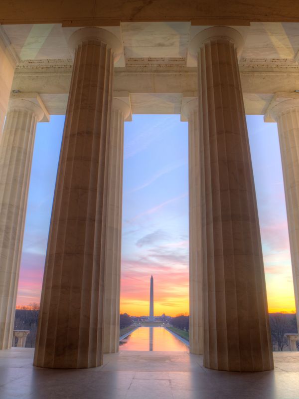 Lincoln Memorial columns overlooking Washington Monument, iconic site for major DC events.