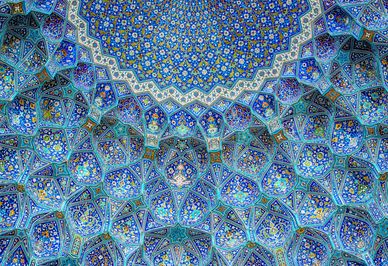 Intricate blue mosaic ceiling with geometric patterns and floral designs.