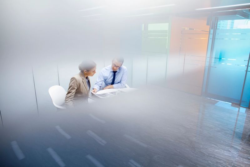 Business colleagues meeting together in room