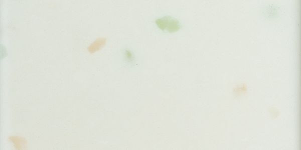 Family smiling around a kitchen island