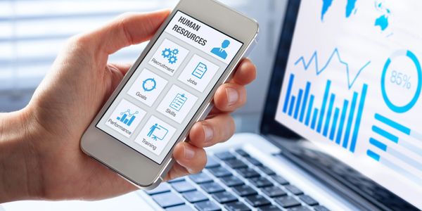 Mobile app displaying human resources management options in a business setting.