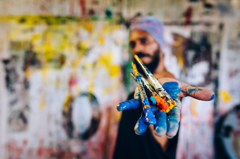 Brazilian artist working at atelier.