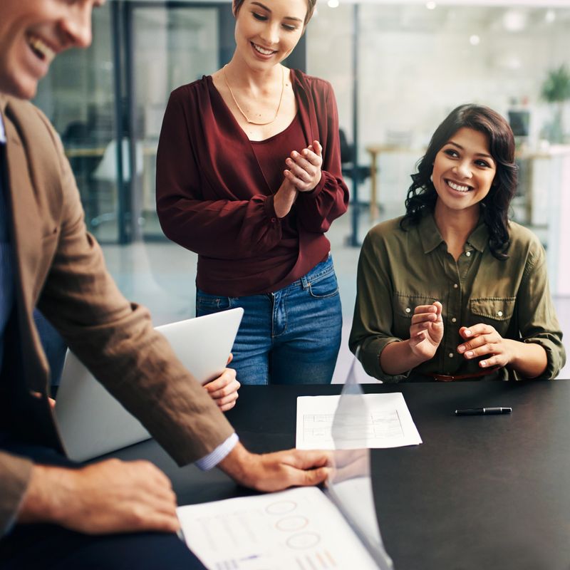 Shot of a group of colleagues having a meeting at work