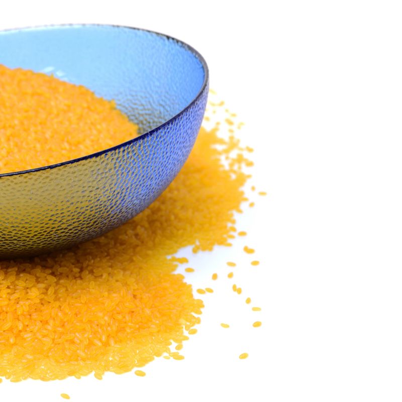 Yellow rice，Golden rice（Raw Organic Yellow Saffron Rice ）  on white background