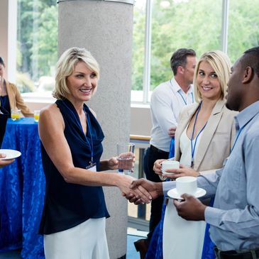 Senior care professionals networking at an industry conference.
