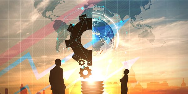 Silhouettes of two people with a lightbulb gear and global map backdrop symbolizing innovation and global strategy.