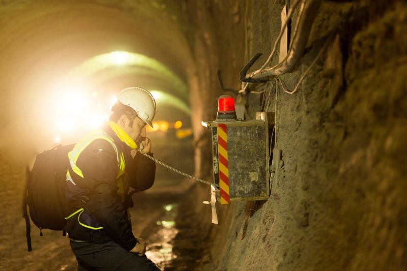 Worker using emergency phone