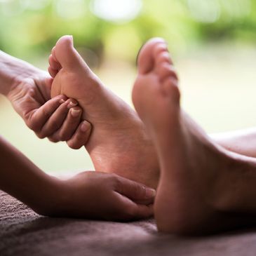 Relaxing foot reflexology session
