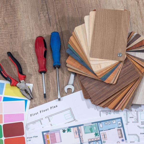 Flooring design samples, tools, and color swatches for laminate and luxury vinyl plank installation by Property Channel Flooring.