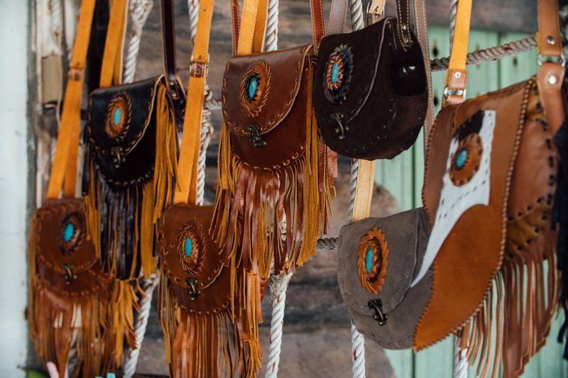 Authentic women's leather bags and purses in a handmade shop. Hang in the store