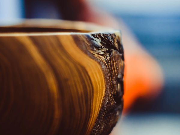 Close-up of a polished wooden surface with natural grain and texture.