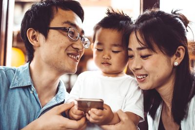 Family members exploring Asian American archives