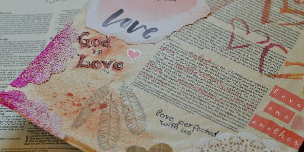 Decorated paper with love-themed messages and illustrations.