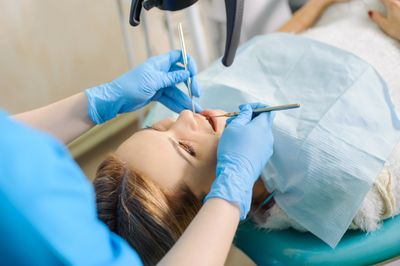 Patient receiving gentle professional dental cleaning at Save Dental in Orem, Utah.