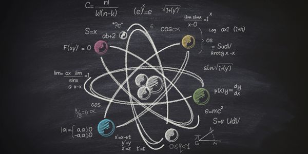 Chalkboard illustration of an atom with colorful electrons and physics equations.