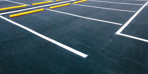commercial parking lot resealed and stripped