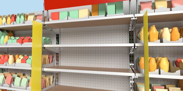 Empty middle shelves in a colorful grocery store aisle with various packaged goods.
