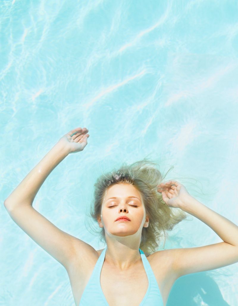 Woman floating in water